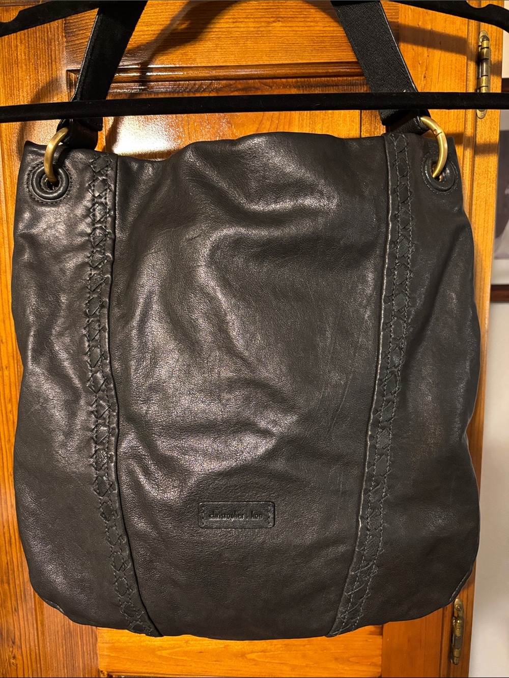Classic Black Leather Shoulder Bag with Braided Trim